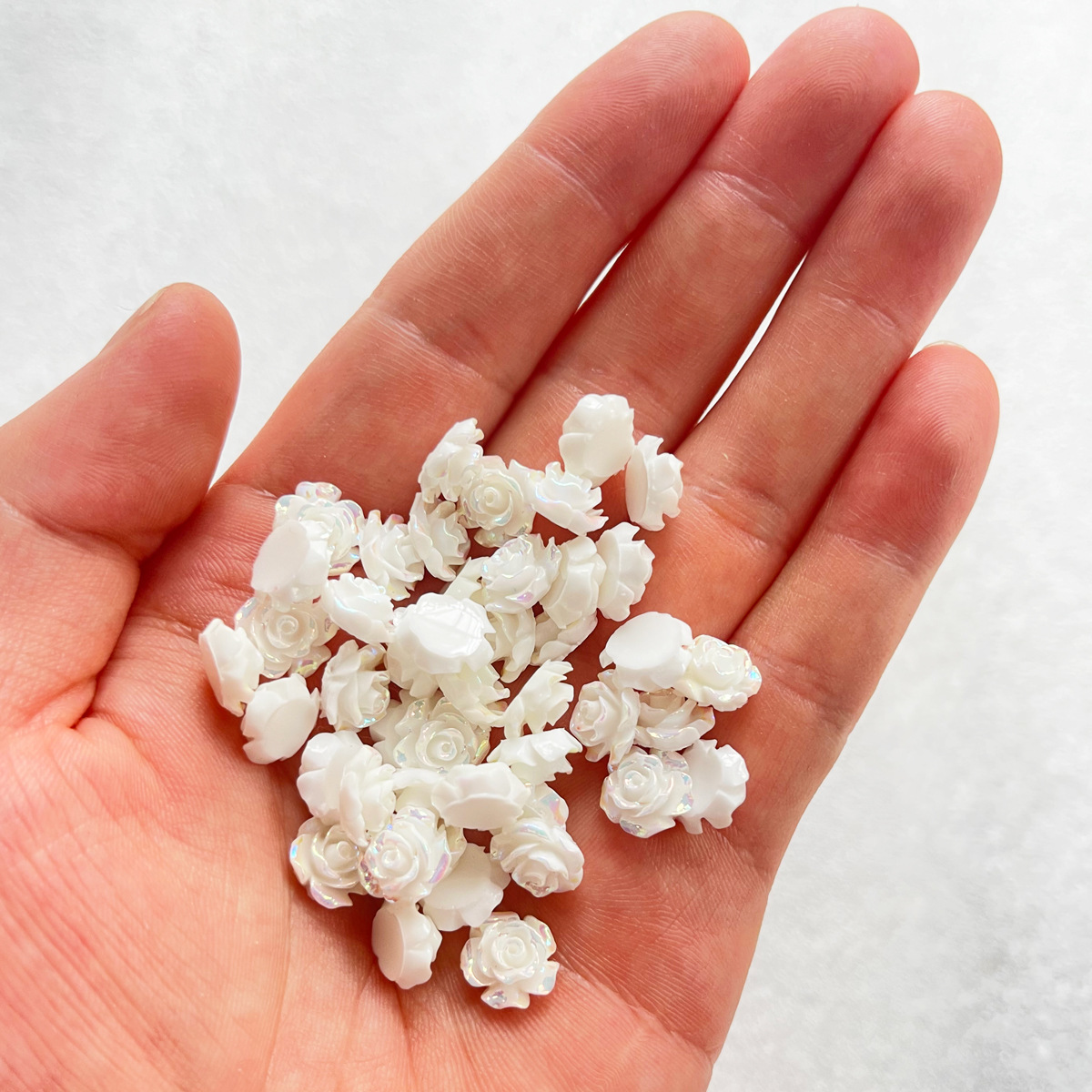 ชาร์มตกแต่งเล็บรูปดอกกุหลาบมุก - Resin Art Rose บทวิจารณ์และราคา